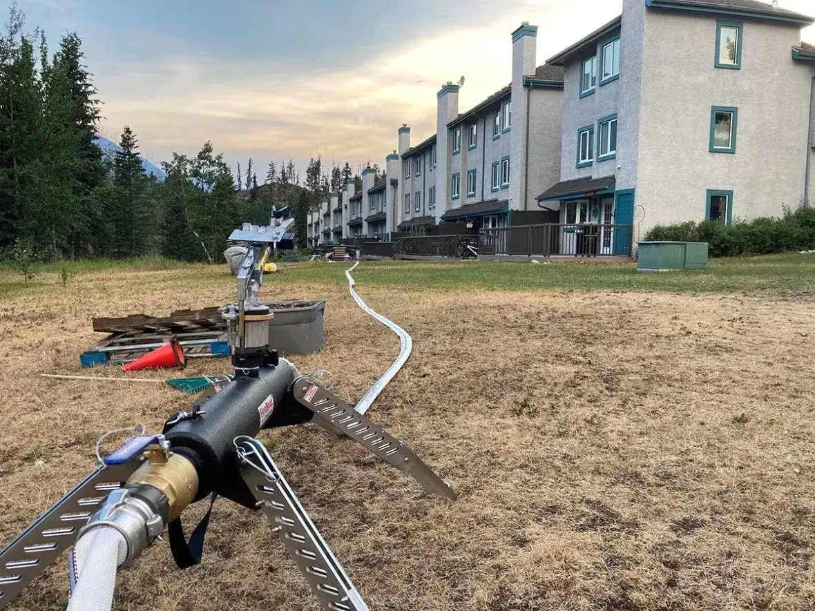 FireBozz Magnum set up on dry ground in front of a row of townhouses in Jasper