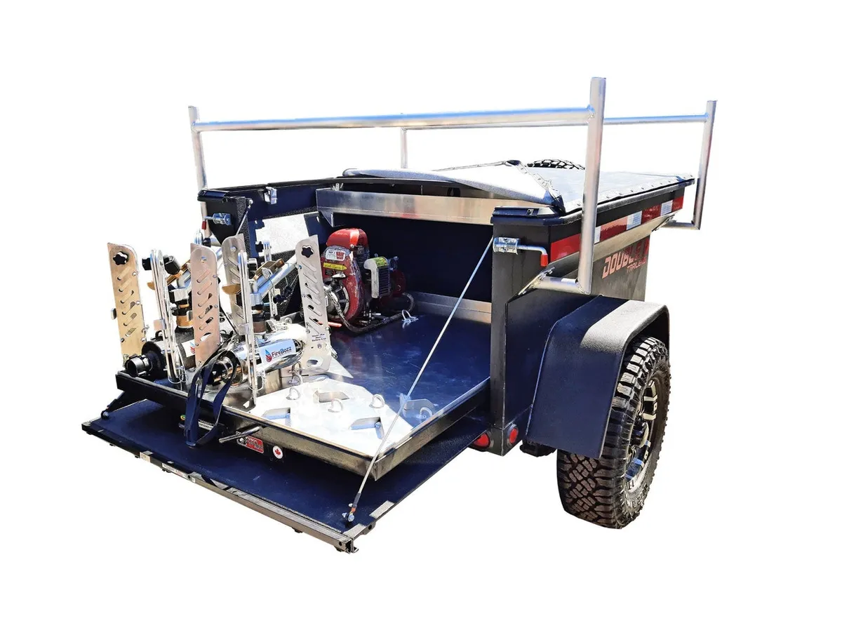 Typhoon wildland fire trailer loaded with pump, hose reel and FireBozz units